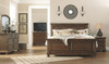 Flynnter Medium Brown 5 Pc. Dresser, Mirror & Queen Panel Bed