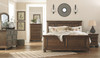 Flynnter Medium Brown 7 Pc. Dresser, Mirror, Chest, California King Panel Bed & Nightstand