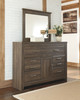 Juararo Dark Brown 6 Pc. Dresser, Mirror, Chest & California King Panel Bed