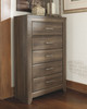 Juararo Dark Brown 7 Pc. Dresser, Mirror, Chest, Queen Poster Bed & Nightstand