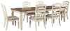 Realyn 7 Pc. Dining Room Set: Rectangular Table with Leaf and 6 Ladderback Side Chairs