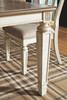 Realyn 7 Pc. Dining Room Set: Rectangular Table with Leaf and 6 Ribbon Backed Side Chairs