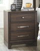 Brueban Brown Three Drawer Night Stand