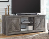 Wynnlow Gray 63'' TV Stand With Glass/Stone Fireplace Insert