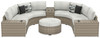 Calworth Beige 7-Piece Outdoor Sectional With Ottoman