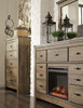 Trinell Brown 2 Pc. Dresser With Fireplace Insert Glass/Stone