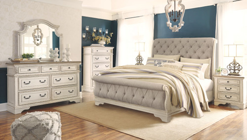 Realyn Two-tone 7 Pc. Dresser, Mirror, King Upholstered Sleigh Bed, 2 Nightstands