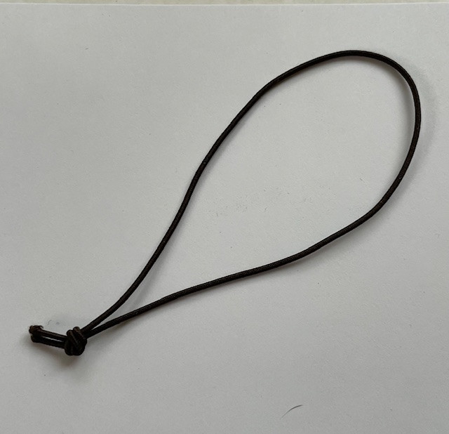 Dark brown 1/16" elastic, 3" long knotted loop