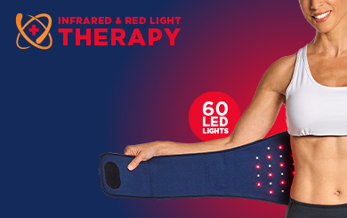 A woman using Tommie Copper's Infrared and Red Light Therapy Back Wrap.