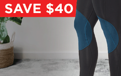 A Woman wearing black Leggings With Knee Support.