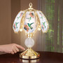 Hummingbird lamp with gold base and stained glass panel; table decoration for any room in the home(D0102HIFA0V.) Hummingbird lamp with gold base and stained glass panel; table decoration for any room in the home(D0102HIFA0V.)