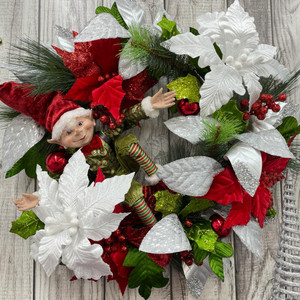 The Curious History of why we use poinsettia, holly and ivy for Christmas Decorating.