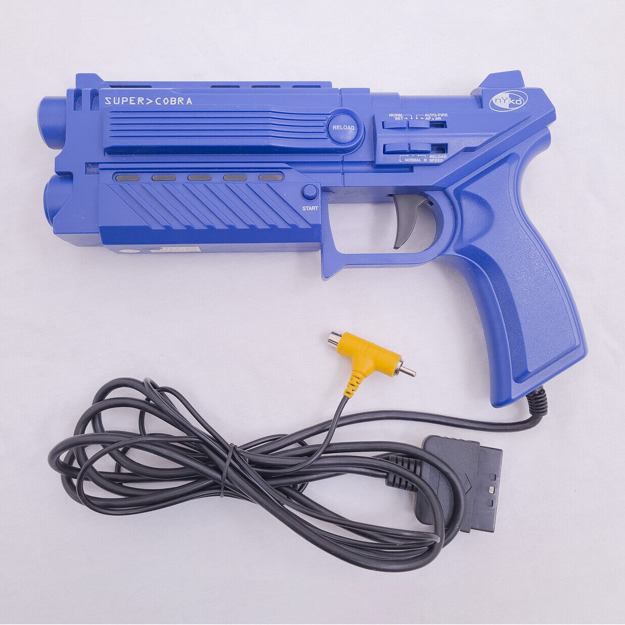 NYKO Cobra Light Gun Pour Sony PlayStation 1 (PS1) - Bleu - Bon état