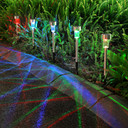 A garden illuminated by Vinsani solar lights with vibrant colour-changing LEDs