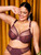 SUGAR PLUM – Jewel-Toned Elegance for the Fuller Bust, EL8900 is more than a bra—it’s a confidence booster for women who expect their bras to feel as good as they look. Styled in this rich jewel tone, it flatters deeper skin tones and brightens fair complexions, all while offering a supportive fit that lifts and shapes with zero compromise. Whether you’re headed to work, brunch, or just living your life, this bra supports you in all the ways that matter—making it a go-to for those seeking inclusive sizes, everyday bra comfort, and professional bra fittings near them. A power piece in your bra wardrobe.