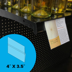 Wine talker shown inserted in sign holder on gondola shelf. Wine talker shown inserted in sign holder on gondola shelf.