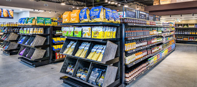 Lozier Gondola Wall Displays With Slat Wood Shelves | DGS Retail