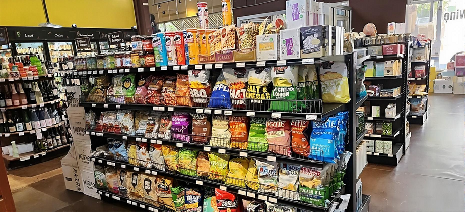 Classic Cherry Wood Gondolas Give Savi Provisions a Premium Convenience Store Look