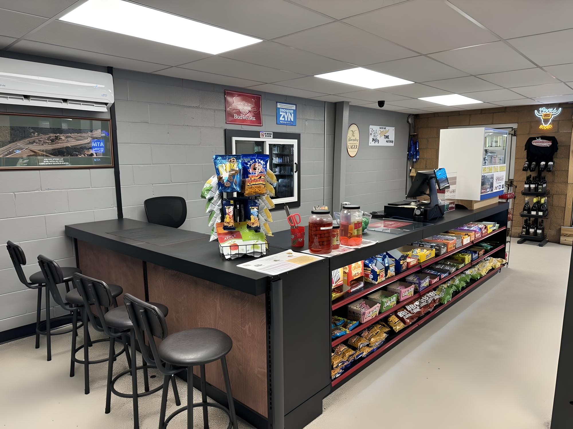 L-shaped wood Lozier checkout counter @ Feudline Beverage & Supply Co.
