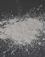 Close-up of Rublev Pumice Fine Grade fine powder texture for oil paints, gesso, and surface preparation