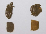 Close-up of Rublev Oleogel clear amber gel consistency on white background and mixed with oil paint for added transparency