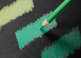 Pablo coloured pencil green tones swatched on white paper; hand drawing matching swatches on black paper