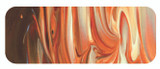 Brush or palette‑knife swatch of Transparent Red Oxide on canvas showing translucent warm layering