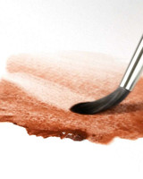 Crimson Ochre watercolour wash spread with brush and water on white paper (Rublev Colours)
