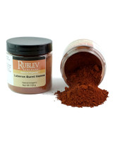 Rublev Colours Luberon Burnt Sienna pigment jar tipped with powder spilling out 100g PR102 burnt sienna dry pigment