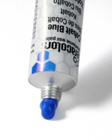 Ceracolors Cobalt Blue tube squeezing out beeswax-based paint onto white background showing smooth paste consistency and opaque coverage