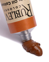 Italian Dark Ochre oil paint squeezed from Rublev 150ml tube showing warm yellow earth colour and smooth paint body
