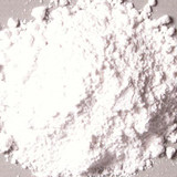 Top view of Titanium Calcium White pigment powder showing bright white fine pigment texture close-up