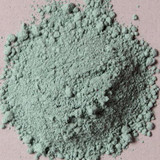 Top view of Nicosia Green Earth pigment powder PG23 showing bright natural green earth texture close-up