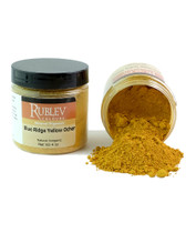 Rublev Colours pigment jar tipped with Blue Ridge Yellow Ochre powder spilling out PY43 yellow earth pigment