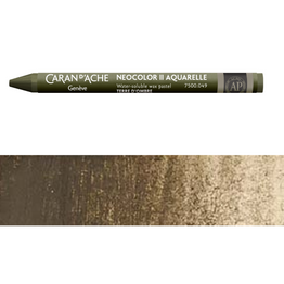 A combination of the Caran d'Ache Neocolor II Aquarelle wax pastel pencil in "Terre D’Ombre," paired with a color swatch beneath. 