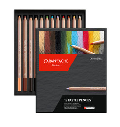 Open Caran d’Ache 12 pastel pencil tin showing neatly arranged vibrant artist-grade pencils