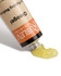 Artist squeezing Rublev Oleogel from an open 150ml tube with a palette knife for mixing with pigments and paints