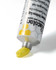 Ceracolors Cadmium Yellow Light tube squeezing out beeswax-based paint onto white background showing thick paste consistency and high opacity