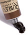 Close up of Rublev Cyprus Umber Medium oil paint squeezed from 50ml tube, rich dark umber colour