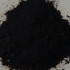 Top view of Bone Black pigment powder PBk9 showing deep black carbon texture close-up