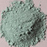 Top view of Nicosia Green Earth pigment powder PG23 showing bright natural green earth texture close-up