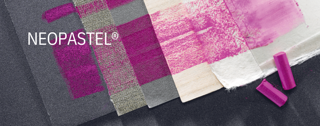 Caran d’Ache Neopastel pink oil pastel stick with blended swatches and texture samples on canvas, wood, paper and linen