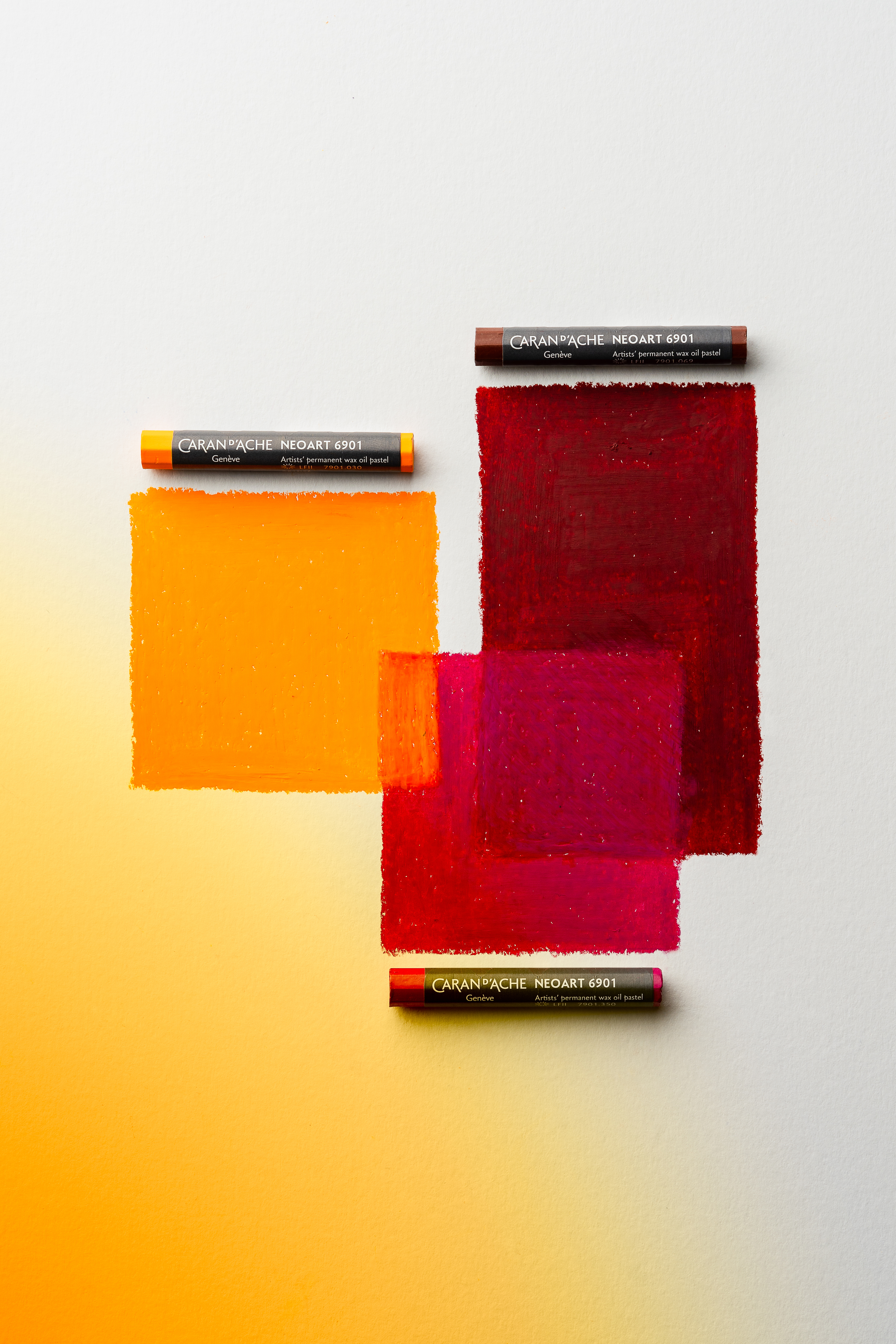 Orange, red and magenta colour swatches created with Caran d’Ache Neoart 6901 wax oil pastels on paper
