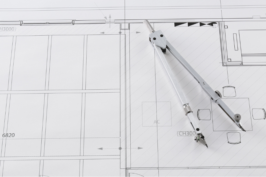 Drafting compass on architectural floor plan — model-making & architecture supplies at Kadmium Ultimo, Sydney Art shop