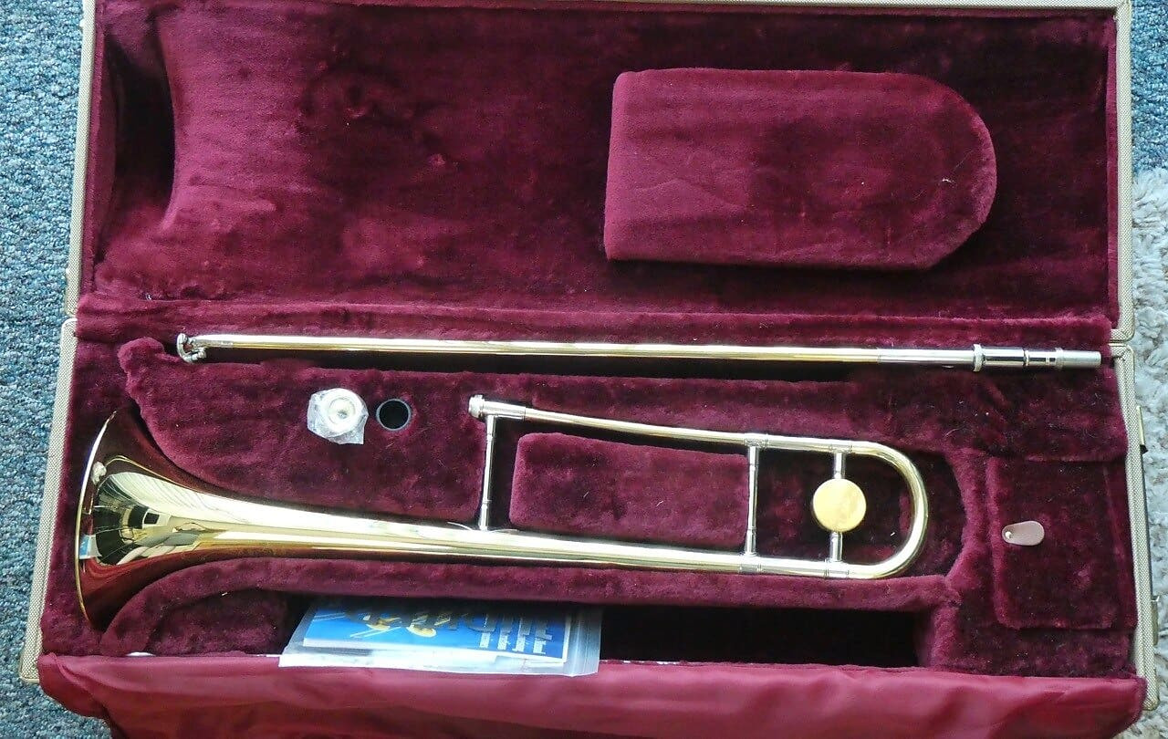 Manchester Brass Professional Tenor Trombone with Red Brass Bell