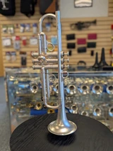 A lot of horn in this listing!  Harrelson Rumors Trumpet SN20 out of 31 in brushed silver
