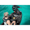 Rider reaching into the front storage bin of a Sea-Doo where the organiser sits