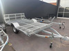 Towrex ATV/SSV tilt trailer SSV14B, galvanised with mesh deck, outside the dealership