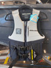 Sea-Doo Adventure X PFD 830201297 in light grey and black, front view on a hanger