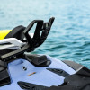 Spark spotter handle fitted to a light blue Sea-Doo Spark on the water